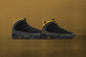 Air Jordan 9 Retro (GS) "University Gold" - Black/Dark Charcoal