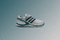 Adidas x Sporty & Rich Adistar Control 5 - White/Carbon/Pure Teal