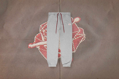 Jordan x Teyana Taylor Women’s Fleece Pants - Dark Grey Heather/Team Red